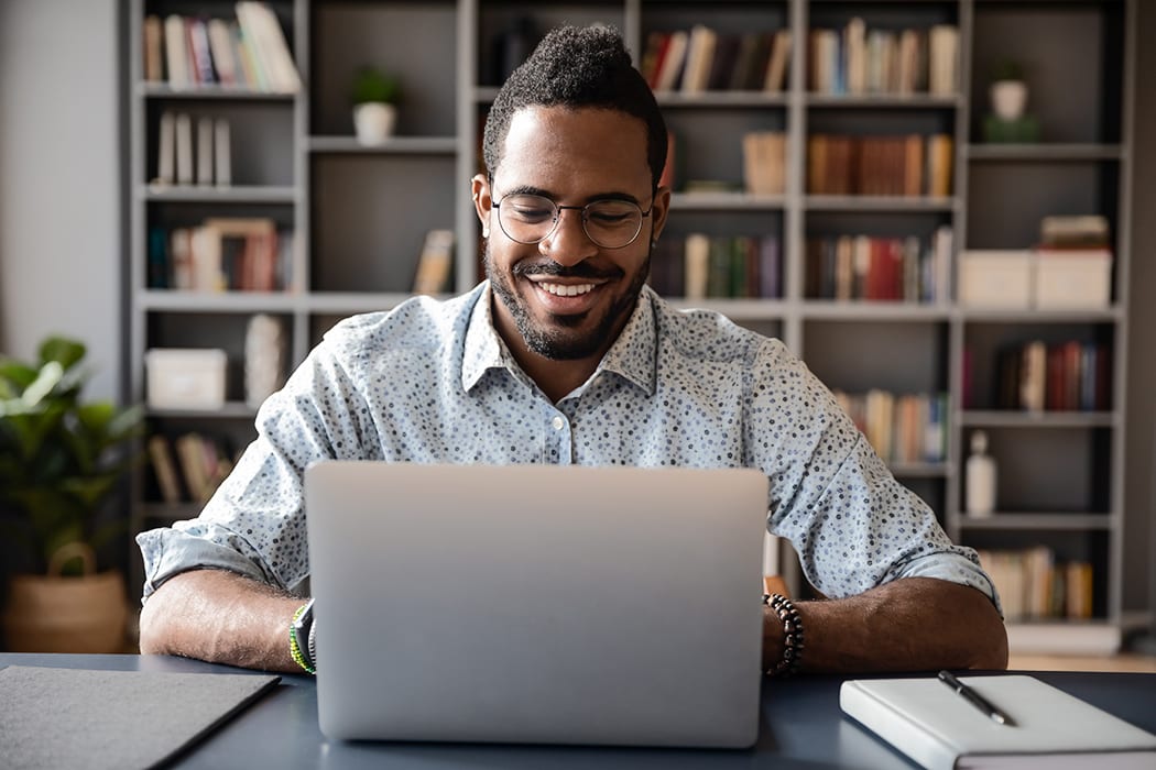 Handsome African American Student with great hair plays Statecraft Simulations